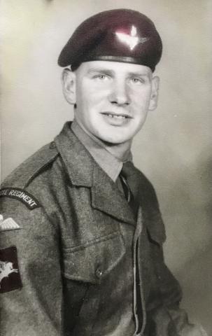 OS John B Smith in uniform and beret