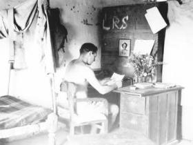 John B Sanderson at his desk, India