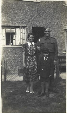 OS Dvr. C.M. Mackrell. R.A.S.C. with his wife and son. 1940/1941