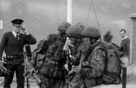 RUC officer and Paras waiting to go out on patrol Cookstown