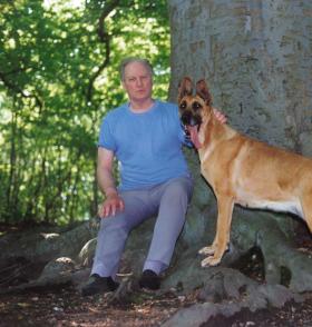 Bill baker in his 60s with his dog Tilla