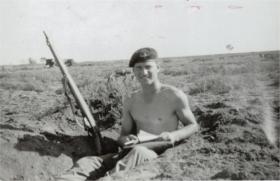 Private Bill Baker sat in a trench with his No.4 rifle, likely Cyprus or Egypt 1951/2