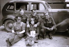 OS Arthur Picken and friends sitting by a car