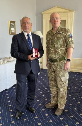 OS Receiving  Imperial service medal from The the Deputy Commander Army Aviation at RAF Wattisham 