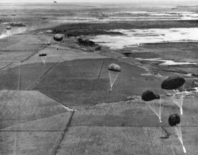 Supply chutes being dropped as part of an Indian airborne resupply