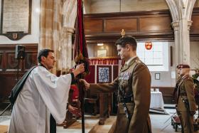 OS Handing colours to Rev Mark Wallace, Vicar of St Peter’s Church.jpg