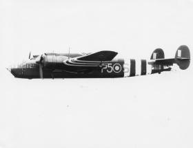 An Albermarle in flight, sporting invasion stripe markings as used in Europe 1944/1945