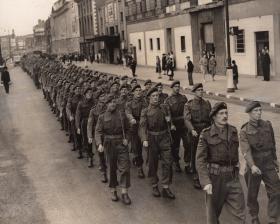 Lieutenant Colonel Allen Parry leading the 9th Battalion through London on parade