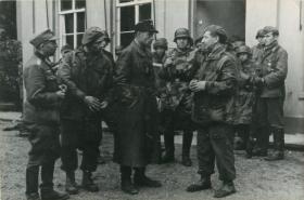 Polish paratroopers being interrogated by Germans.