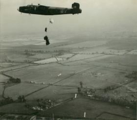 Halifax bomber dropping Jeep and containers during a practice run near Netheravon, 1946-47.