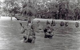 Members of 12 Para Bn landing at Morib Beach, Malaysia, September 1945.