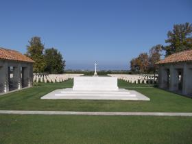 View of Altar of Remembrance with Cross of Sacrifice in background, Bari War Cemetery 2011.