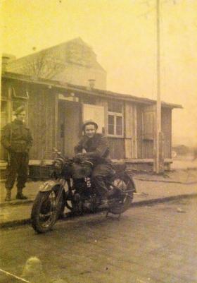 Pte Harold Black on guard duty with unknown despatch rider, Germany