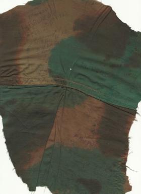A piece of Sgt Lutener's parachute used in Operation Biting and signed by his colleagues.  