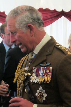 HRH Prince of Wales talks to next of kin at the National Memorial Arboretum, 13 July 2012.