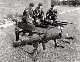 Small Arms laid out for a demonstration, a Carl Gustav is in the foreground, circa 1970s.