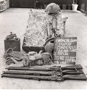 CLE containing various weaponry and ammunition, including Vickers Gun and tripod.