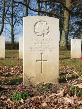 Grave of Sgt Kelly, Hotton War Cemetery, Belgium, 2015.