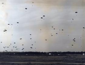 Massed descent onto Stanford Training Area by men of 44th Parachute Brigade (TA), Ex King's Joker, 1953