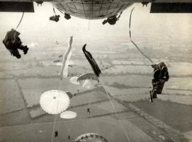 Members of 16 Para Bde Sig Sqn jumping from a Hastings, 6 December 1956.