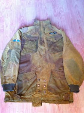 Denison Smock 2nd Pattern with cuffs added; no date. 2nd Glider Pilot wings on left breast, late war wings on right arm.