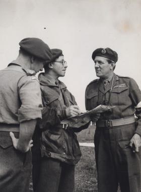 Maj Gen Bourne in discussion with officers of 16th Airborne Division on exercise in Germany BAOR 1952