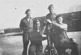 Members of 6th Para Bn posing with a mortar, Palestine c1946