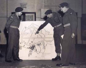 Officers of 16 Airborne Division discuss a mock attack on American forces at Upper Heyford airfield