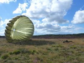A paratrooper lands on Ginkle Heath during the 68th anniversary of Arnhem, 22 September 2012. 