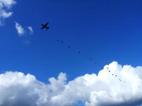 Paratroopers descend from a Hercules onto Ginkle during 68th anniversary of Arnhem, 22 September 2012.