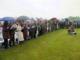 Bedraggled VIPs at the service of dedication for the Airborne Forces National Memorial, NMA 13 July 2012.