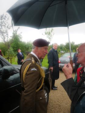 HRH Prince of Wales talks to veterans at the National Memorial Arboretum, 13 July 2012.