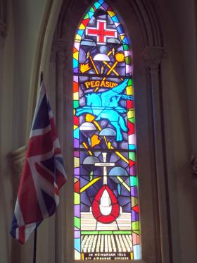 Stained glass window commemorating the 6th Airborne Division in Ranville Church, Normandy, France, 2014. 