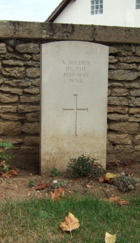 Headstone of an unknown solider, Ranville Churchyard, August 2010.