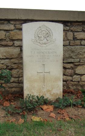 Headstone of Cpl Henderson, Ranville Cemetery, August 2010.
