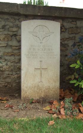 Headstone of Pte E Blackburn, Ranville Churchyard, taken August 2010.