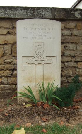 Headstone of L/Bdr John Wainwright, Ranville Churchyard, August 2010.