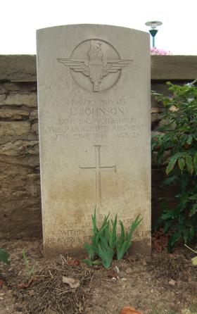 Headstone of Pte L Johnson, Ranville Churchyard, August 2010.