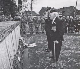 Des Page salutes his fallen comrades in Hamminkeln, March 2015.