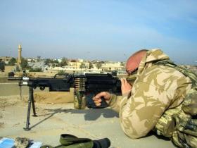 Pte Steve Lewis with a Light Machine Gun, Iraq, 2005.