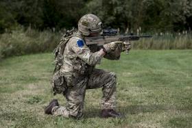 A soldier from 2 PARA adopts a firing pose wearing VIRTUS kit and equipped with a prototype SA80A3, September, 2016.