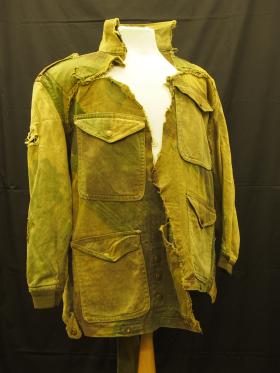 The early pattern smock of CSM Warcup damaged in 1944 on Op Varsity, from the Airborne Assault Museum Collection, Duxford.