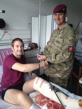 Spr Daniel Watson being awarded his wings in hospital, undated.
