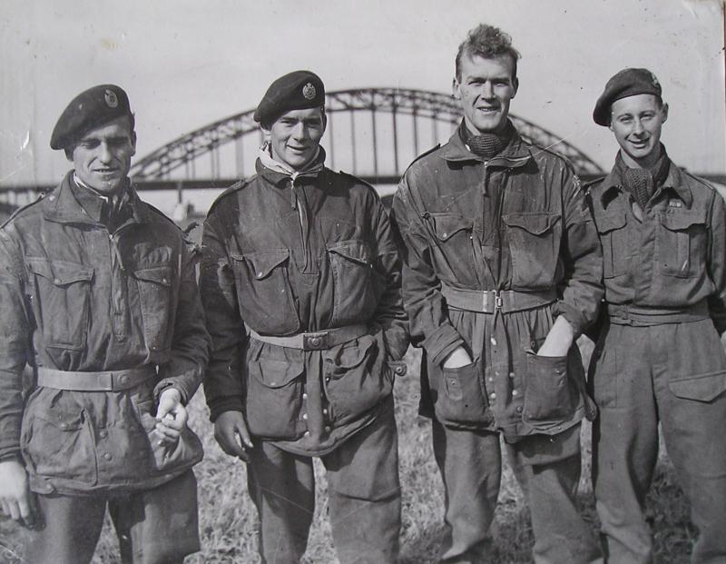 4 Escapers of 1 Para Sqn RE standing in front of Nijmegen Road Bridge