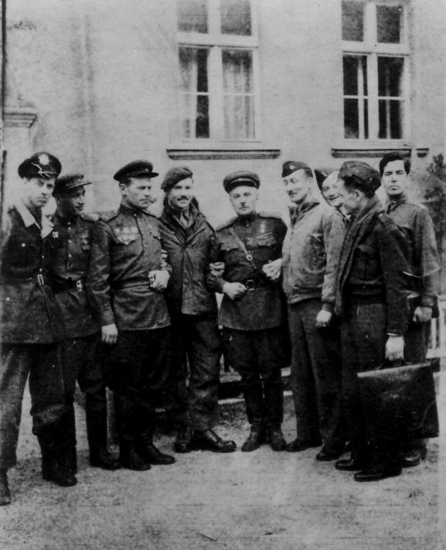 British and American POW's of Stalag Luft 1, with their Russian liberators. April 1945.