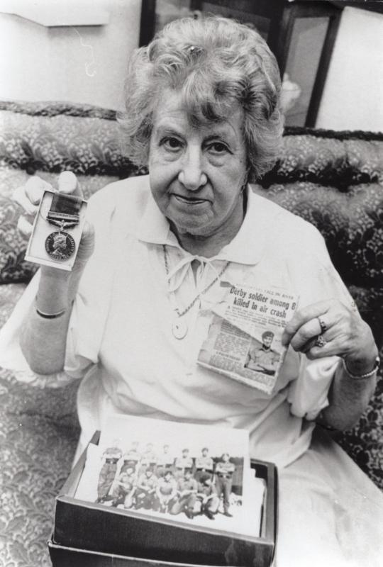 Mrs Florence Green (later Trotman), Robert Greens mother with his medal, photo and press cutting.