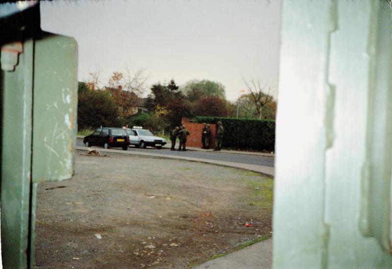 OS Photograph taken from the inside of a snatch vehicle of a stop and search vehicle check point in West Belfast.