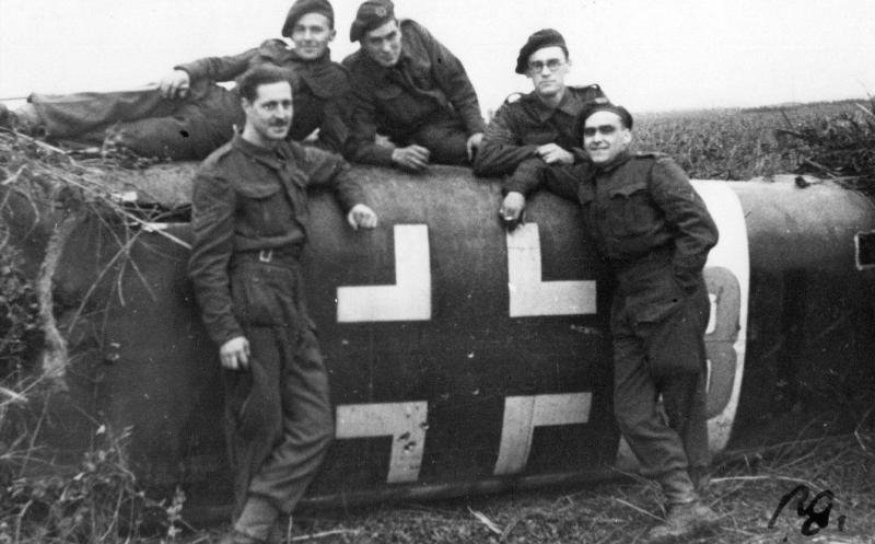 Beja 1942 Bren gun fire crew pose for another photo with a shot down Ju88 bomber.