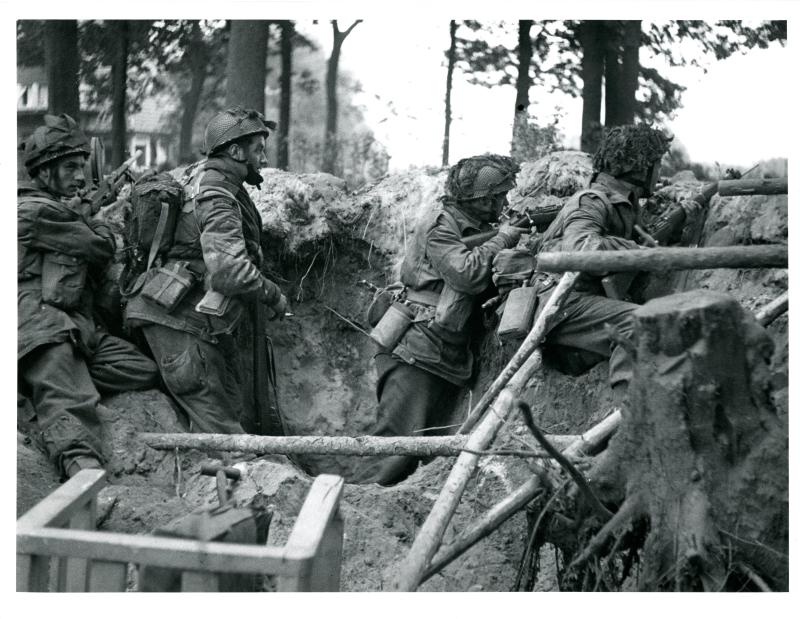 AA Men of No 3 Platoon, R Company, 1st Parachute Battalion armed with Bren gun and No. 4 rifles defend a large shell hole.