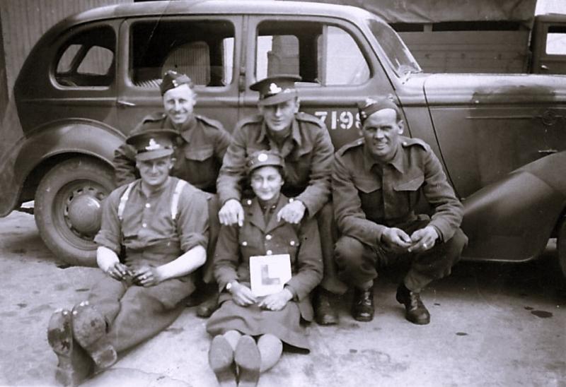 OS Arthur Picken and friends sitting by a car